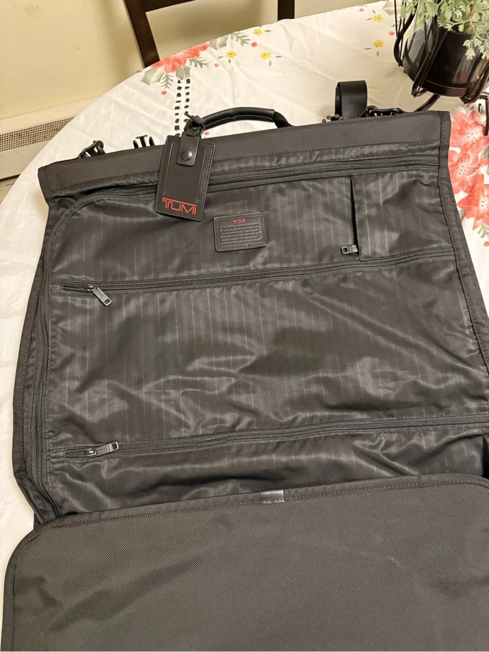 Tumi Black Roll-Top Briefcase with Red Logo Tag